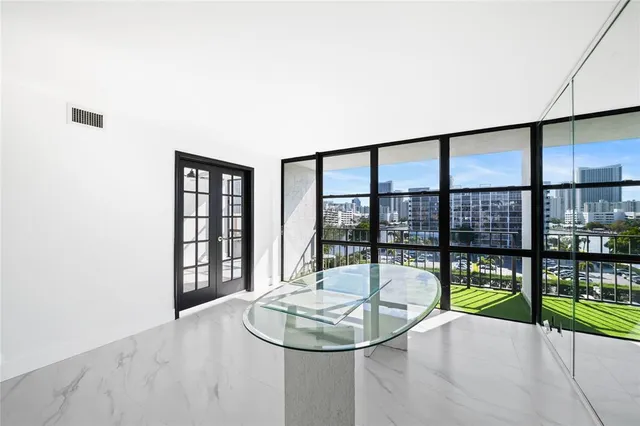 a view of a living room and a window