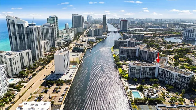 a view of a city and swimming pool