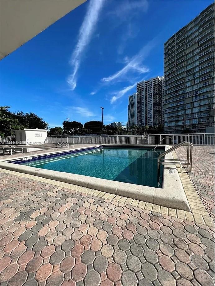 145 Southeast 25th Road, Unit 801 Miami, FL 33129 - Photo 12 of 12 a view of a swimming pool and an outdoor space