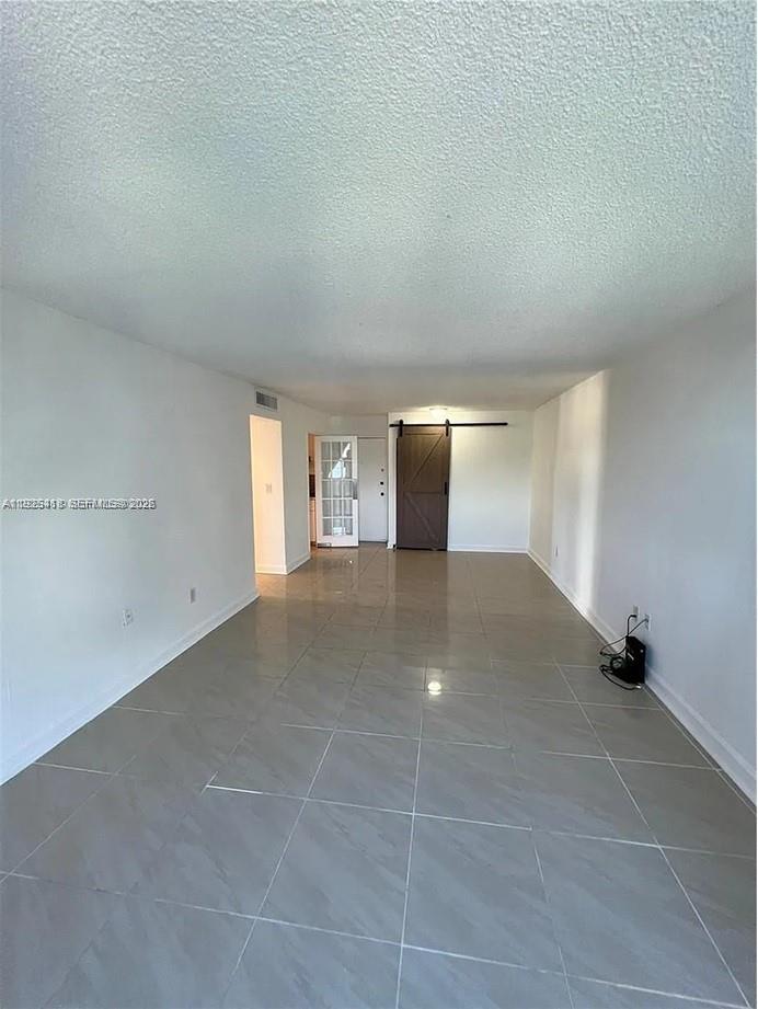 145 Southeast 25th Road, Unit 801 Miami, FL 33129 - Photo 2 of 12 a view of empty room