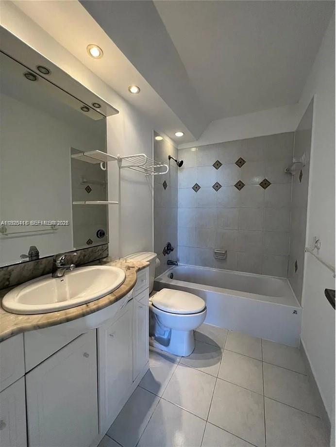 145 Southeast 25th Road, Unit 801 Miami, FL 33129 - Photo 8 of 12 a bathroom with a sink a toilet and shower