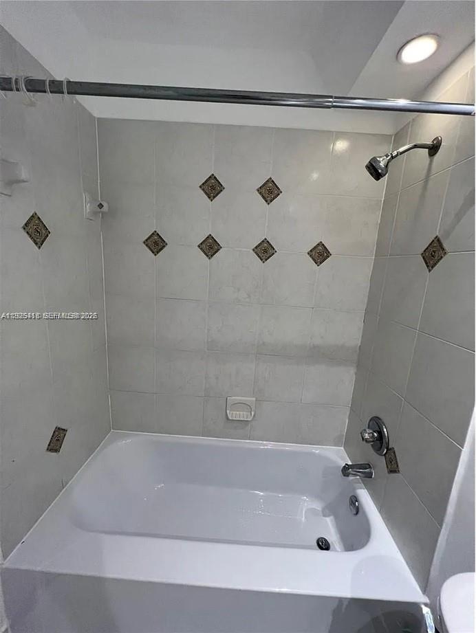 145 Southeast 25th Road, Unit 801 Miami, FL 33129 - Photo 10 of 12 a bathroom with a tub
