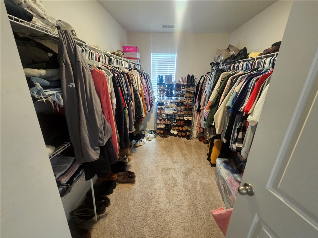 902 Ashwood Lane Easley, SC 29640 - Photo 23 of 39 Plenty of storage space and natural light fill this generously sized walk-in closet.