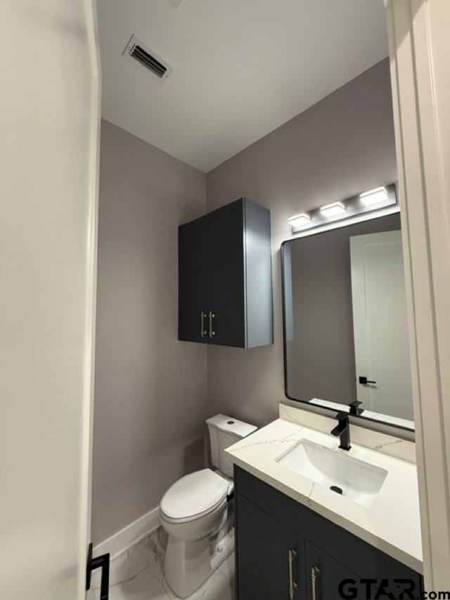 9065 Long Branch Tyler, TX 75703 - Photo 20 of 25 a bathroom with a sink and a mirror