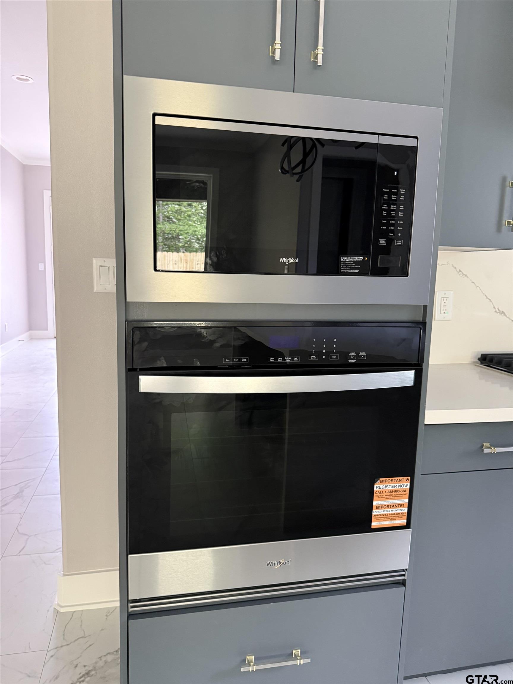9065 Long Branch Tyler, TX 75703 - Photo 10 of 25 a stove top oven sitting inside of a kitchen