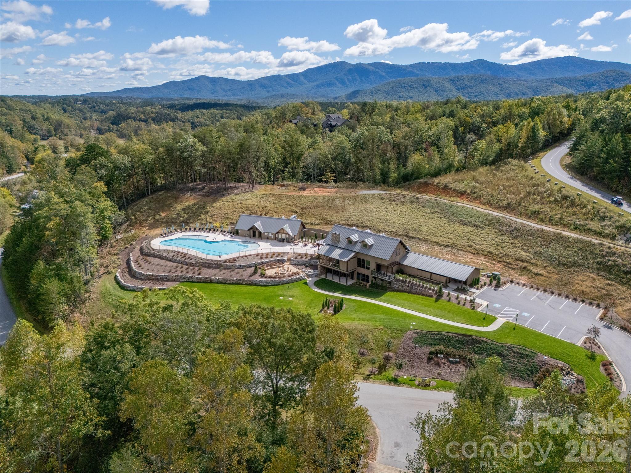 0 Deep Gap Farm Road East, Unit 2021 Mill Spring, NC 28756 - Photo 19 of 31 a view of a house with a yard