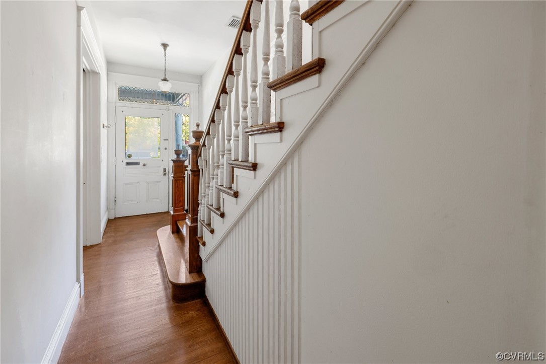 2018 Floyd Avenue Richmond, VA 23220 - Photo 15 of 36 a view of staircase with wooden floor and white walls