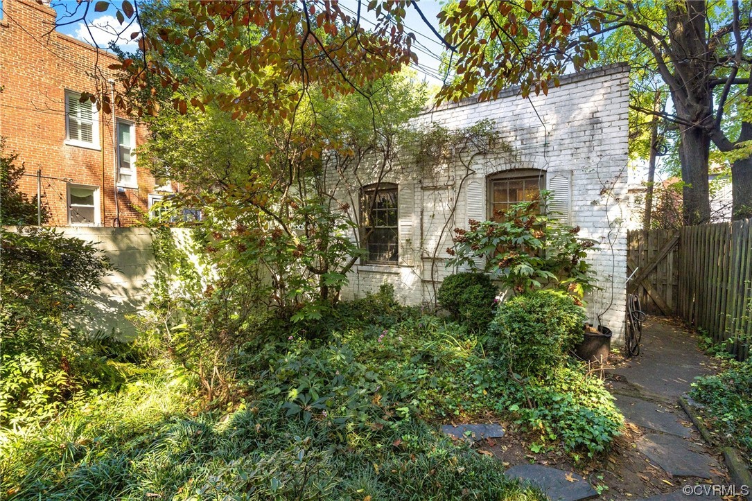 2018 Floyd Avenue Richmond, VA 23220 - Photo 36 of 36 a front view of a house with a yard and fountain