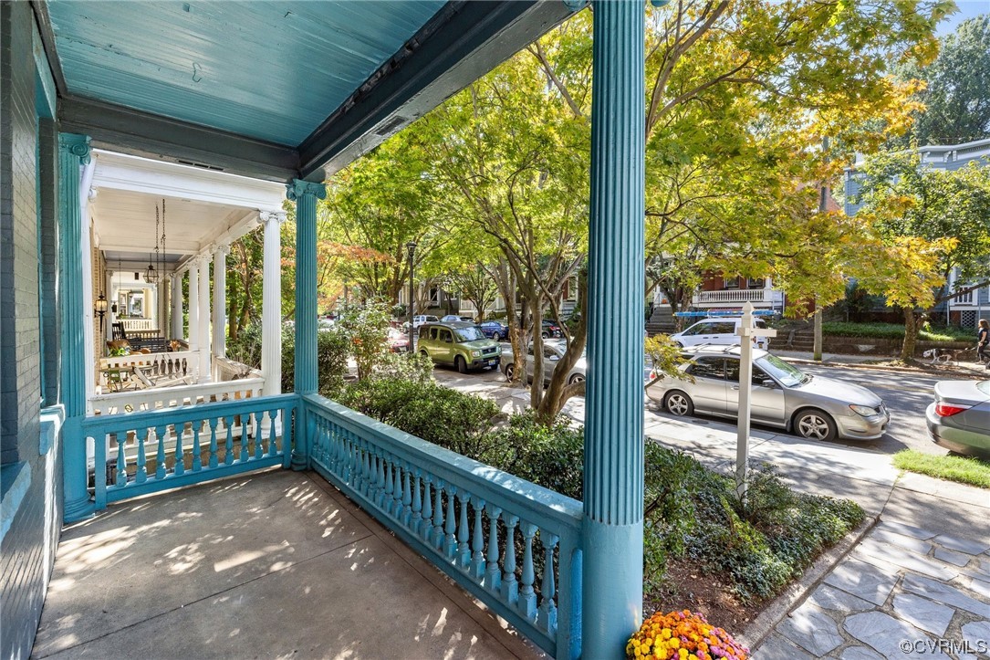 2018 Floyd Avenue Richmond, VA 23220 - Photo 4 of 36 a view of a porch with wooden floor and roof
