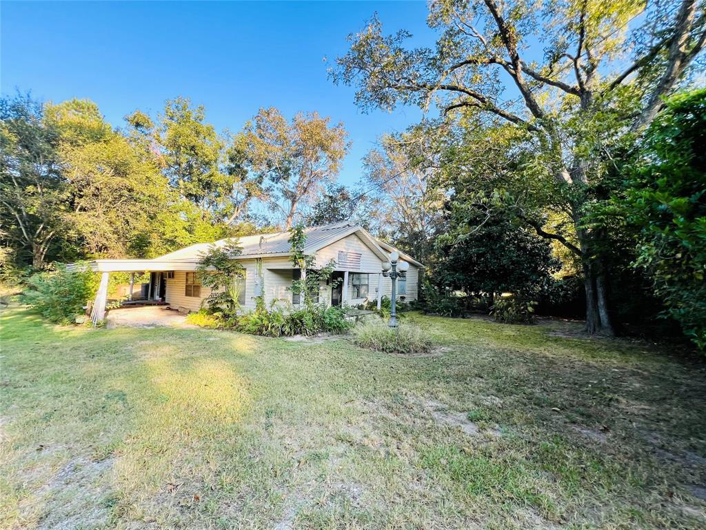 859 Farm To Market Road 2021 Lufkin, TX 75901 - Photo 17 of 20 a view of a house with a yard