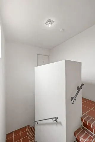 a view of a storage & utility room with washer and dryer