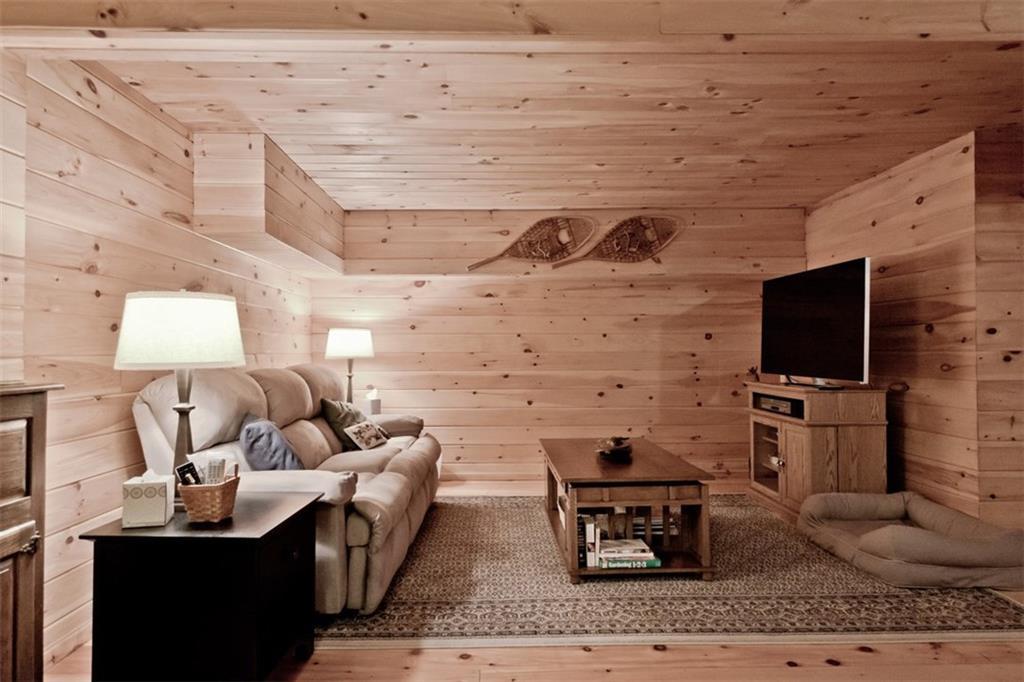60 Mountain Road Bridgton, ME 04009 - Photo 27 of 35 Basement has pine throughout making...