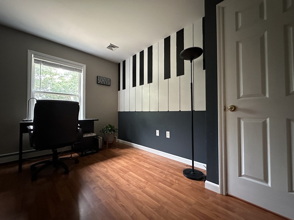 210 Pine Hill Road Russell, MA 01071 - Photo 20 of 29 a view of a livingroom with wooden floor and furniture