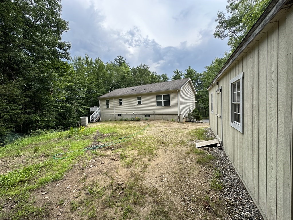 210 Pine Hill Road Russell, MA 01071 - Photo 4 of 29 a house view with a backyard space
