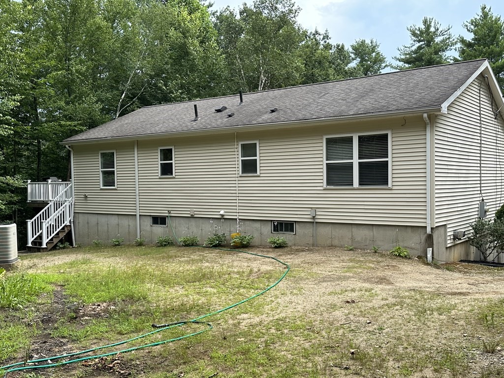 210 Pine Hill Road Russell, MA 01071 - Photo 5 of 29 a view of a house with a yard