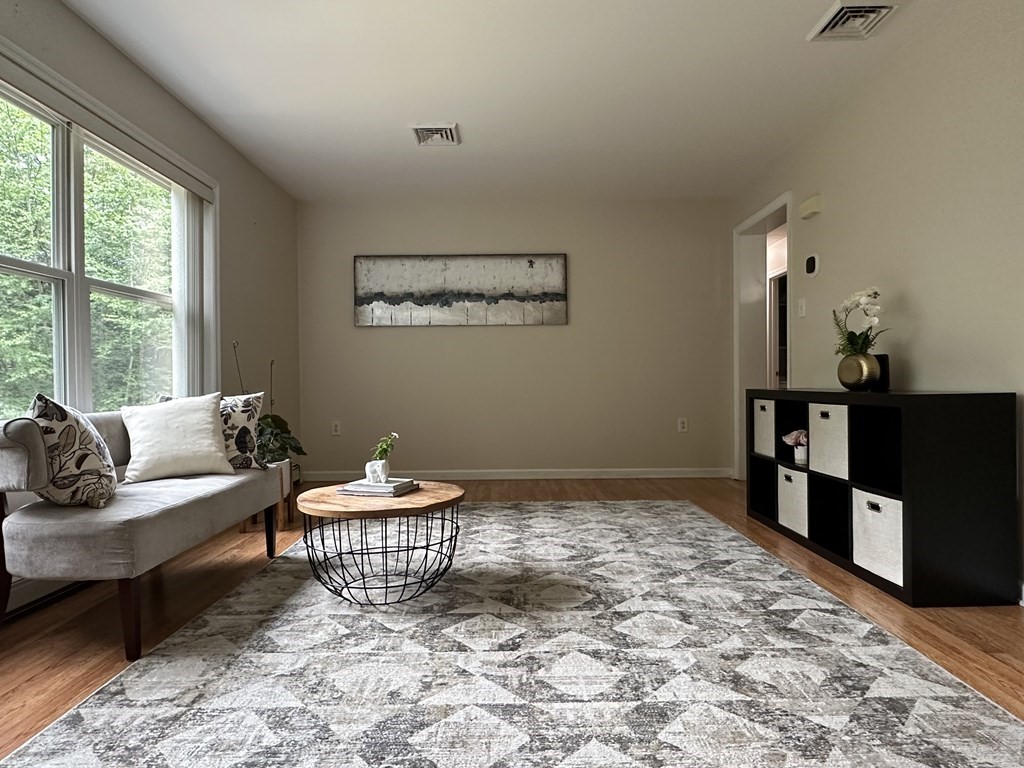 210 Pine Hill Road Russell, MA 01071 - Photo 7 of 29 a living room with a couch and a dresser
