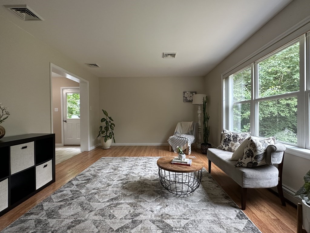 210 Pine Hill Road Russell, MA 01071 - Photo 8 of 29 a living room with furniture and a large window