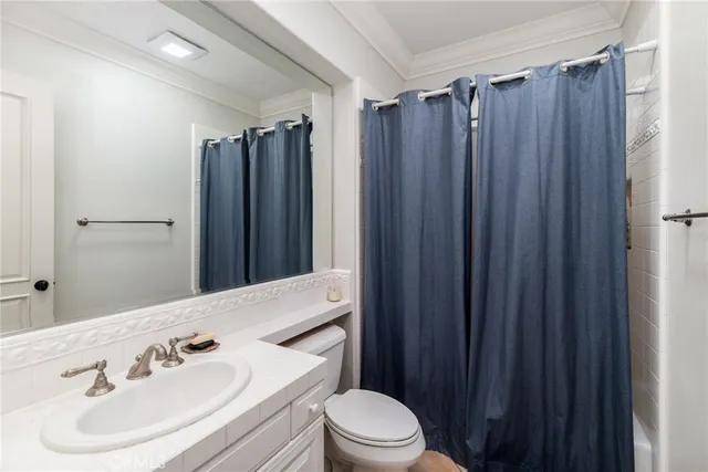 a bedroom with a bed furniture and a window