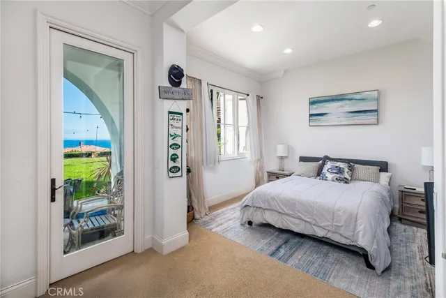 a spacious bathroom with a double vanity sink mirror and shower