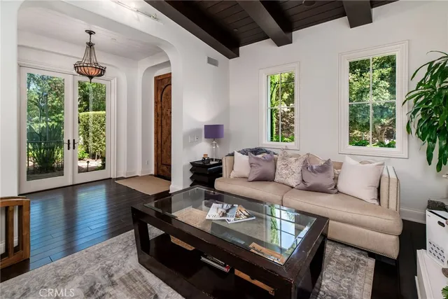 a kitchen with stainless steel appliances kitchen island granite countertop a refrigerator and a stove