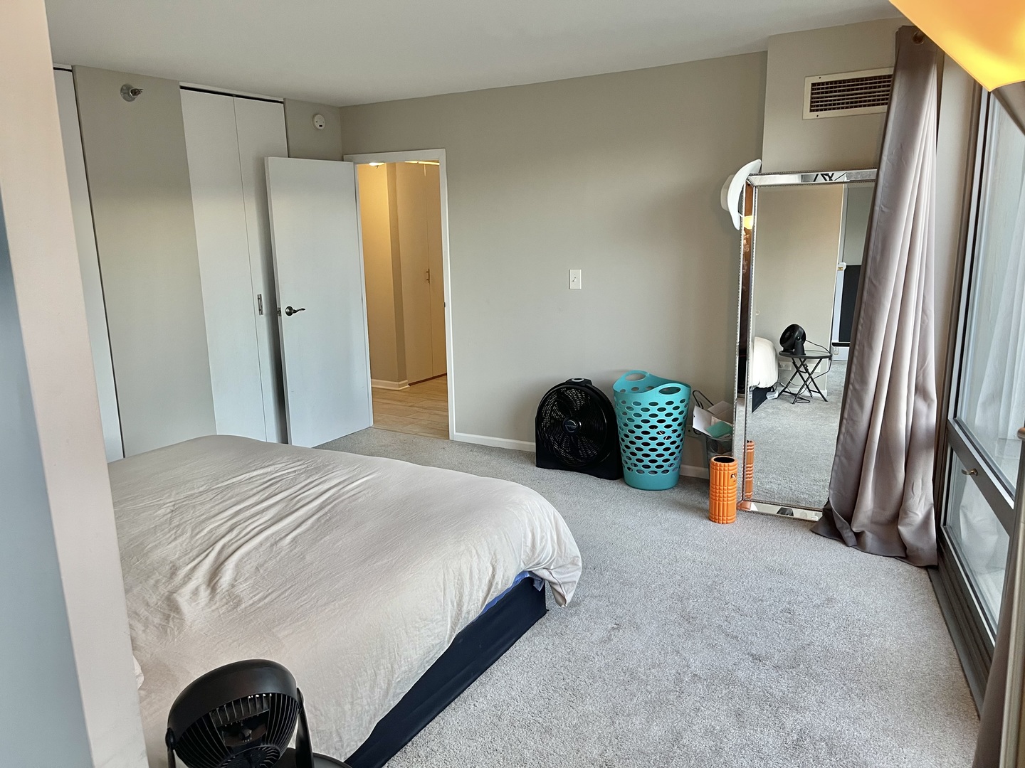 440 North Wabash Avenue, Unit 1903 Chicago, IL 60611 - Photo 18 of 34 a bedroom with a bed and a closet