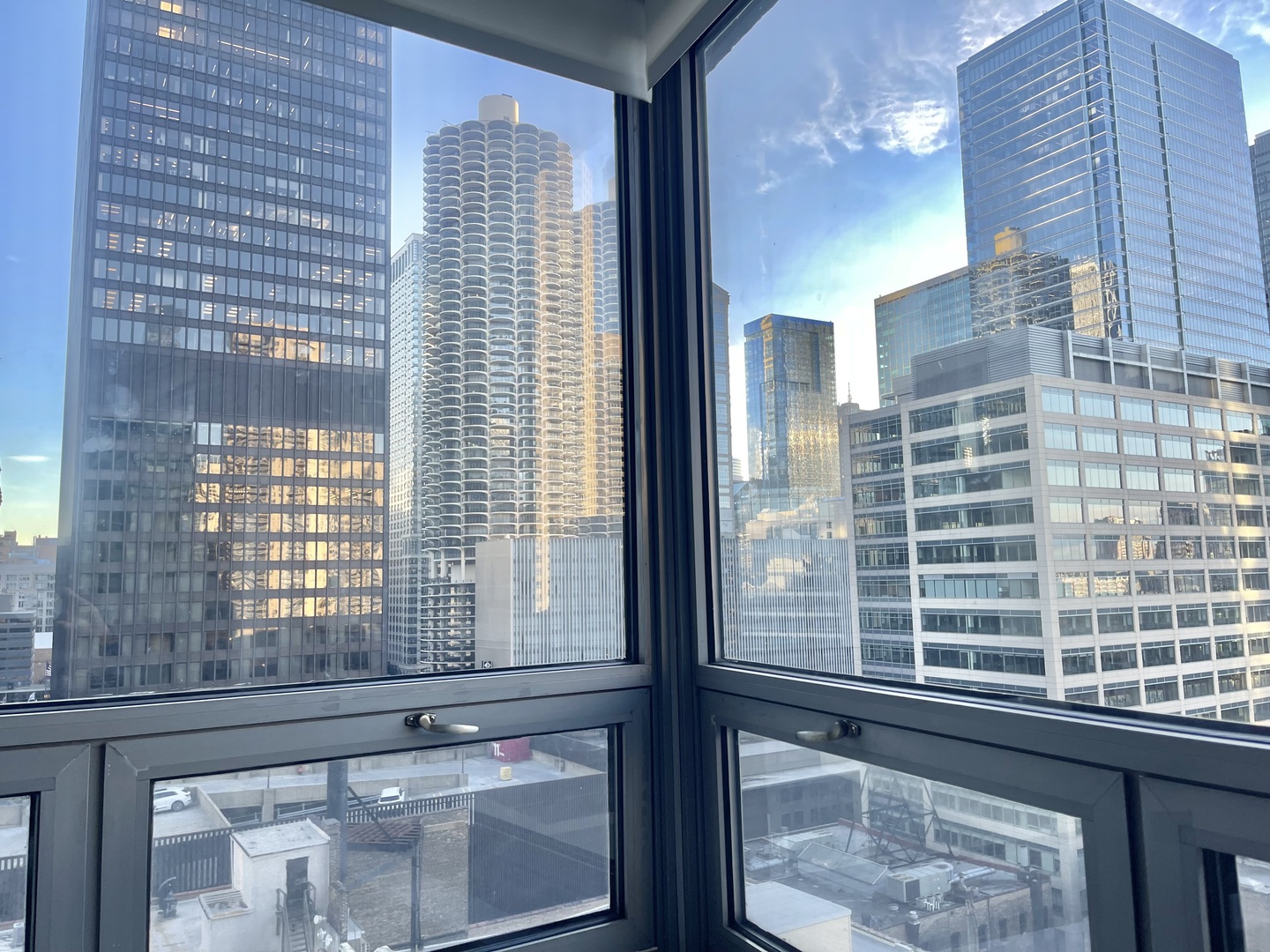 440 North Wabash Avenue, Unit 1903 Chicago, IL 60611 - Photo 22 of 34 a view of a balcony from a window