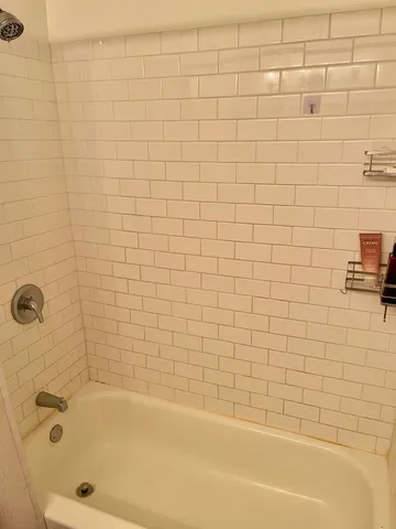 a kitchen with stainless steel appliances wooden cabinets counter space and wooden floor