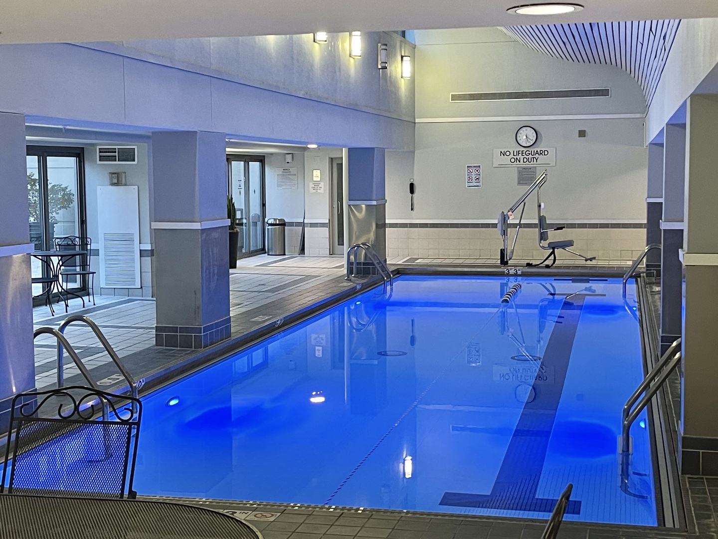 440 North Wabash Avenue, Unit 1903 Chicago, IL 60611 - Photo 28 of 34 a kitchen with stainless steel appliances wooden cabinets counter space and wooden floor