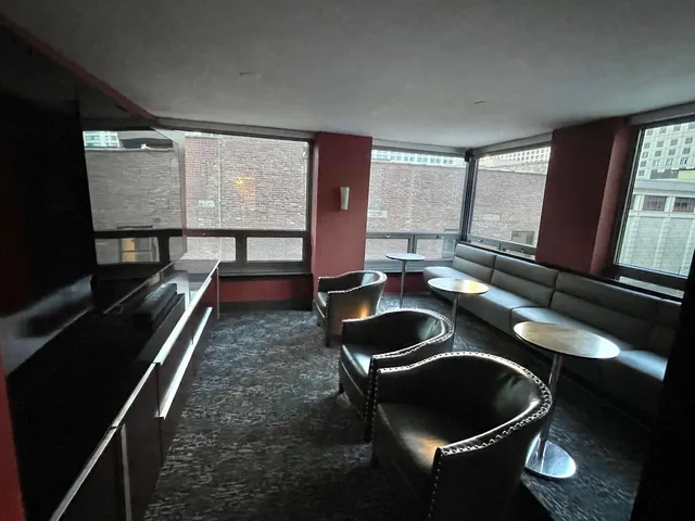a potted plant sitting in front of a house