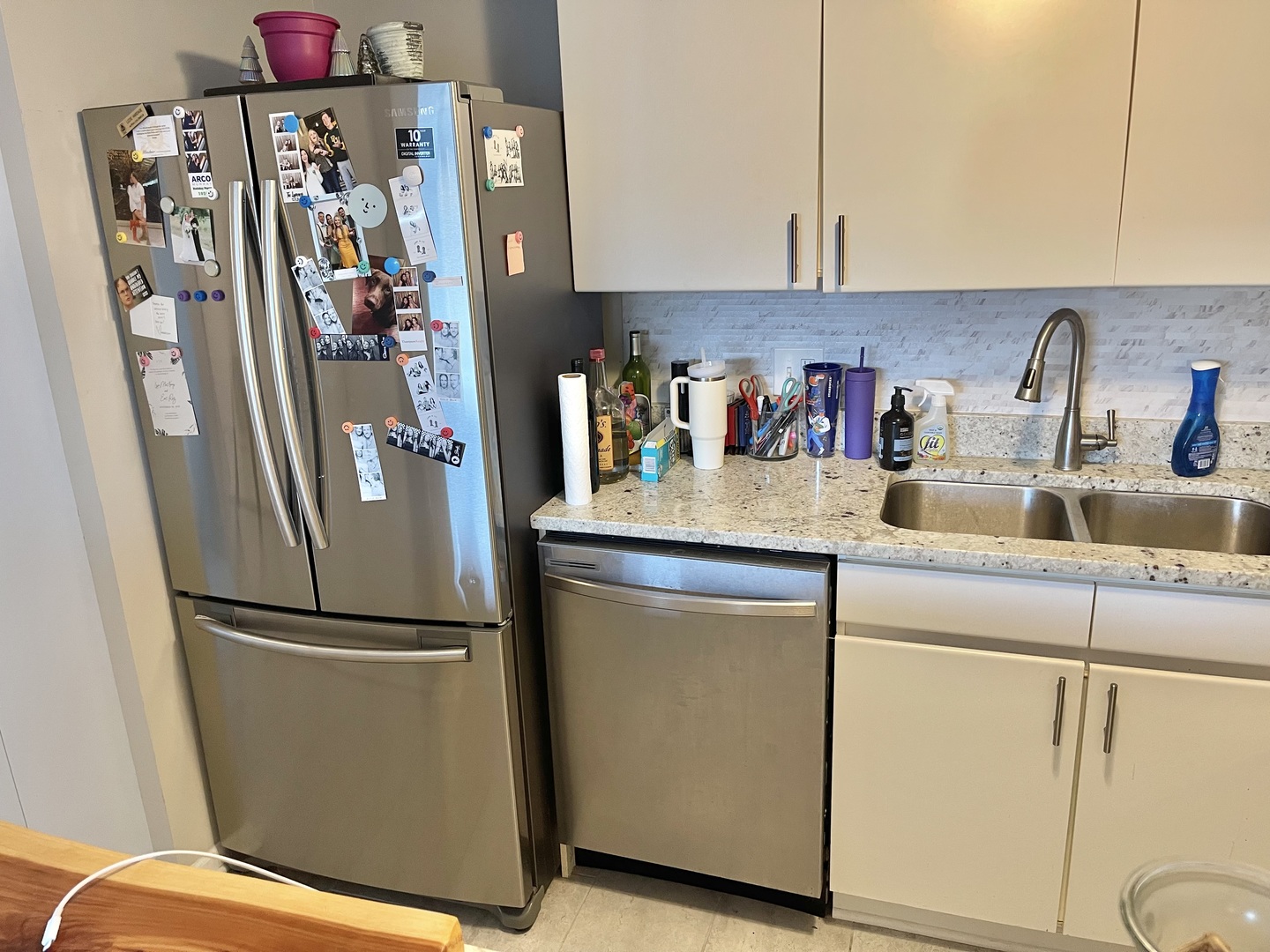 440 North Wabash Avenue, Unit 1903 Chicago, IL 60611 - Photo 10 of 34 a kitchen with refrigerator and cabinets