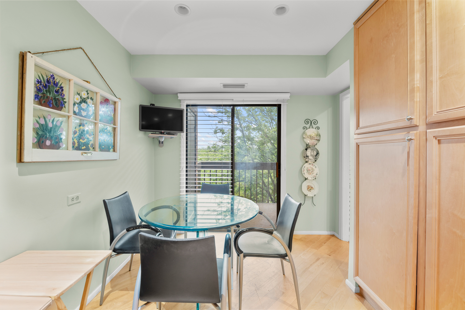 1771 Mission Hills Road, Unit 412 Northbrook, IL 60062 - Photo 9 of 21 a view of a dining room with furniture window and outside view