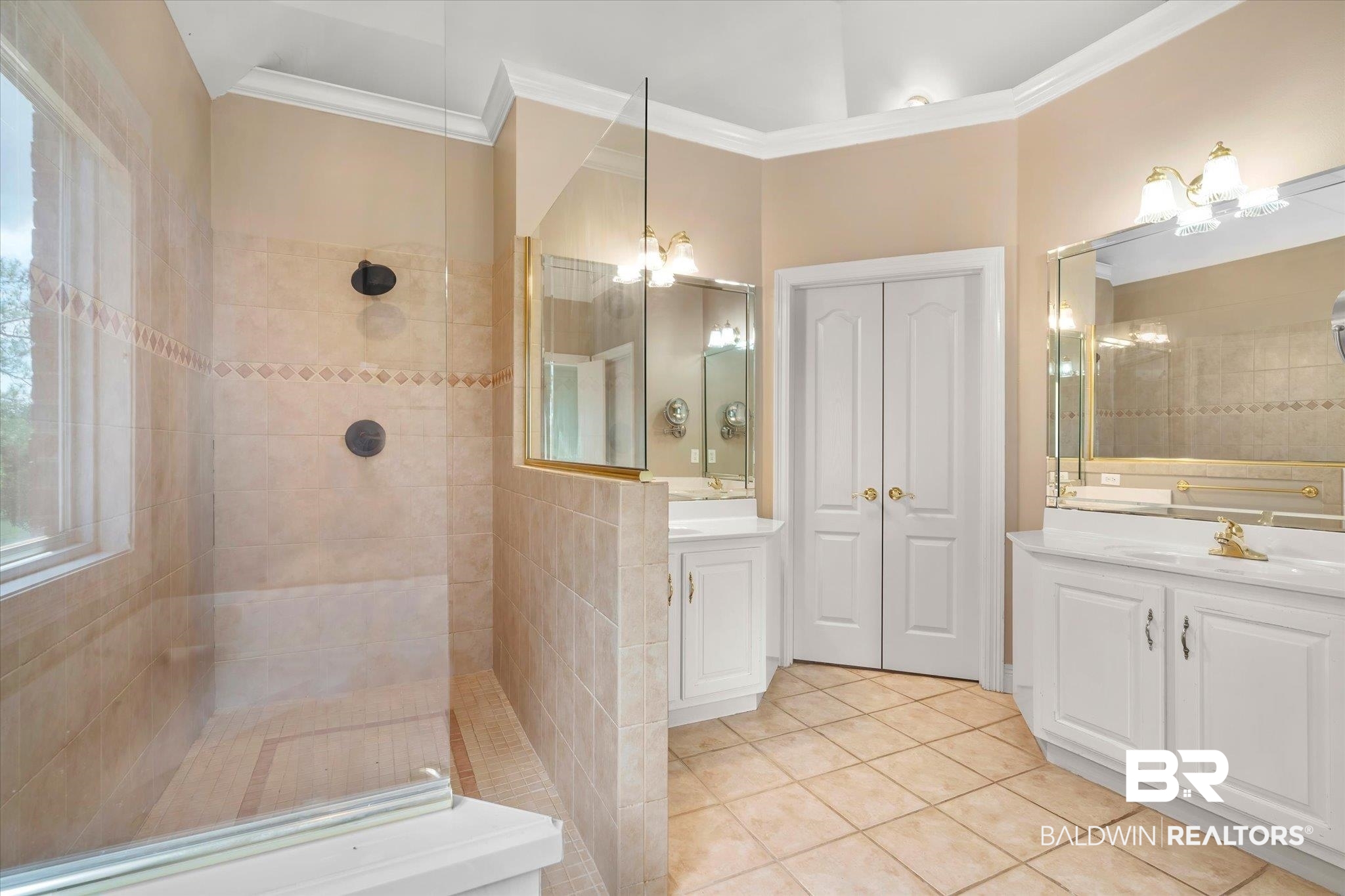 4109 Blue Heron Ridge Mobile, AL 36693 - Photo 14 of 33 Bathroom featuring tiled shower, vanity, and ornamental molding