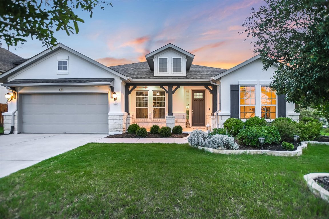 Welcome home to 5608 Cimarron Ridge Lane!