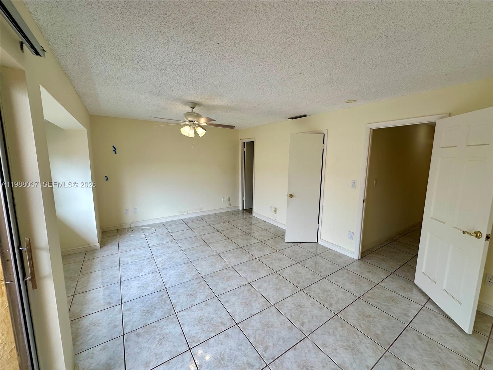 13705 Southwest 84th Street, Unit F Miami, FL 33143 - Photo 10 of 12 an empty room with a bathroom