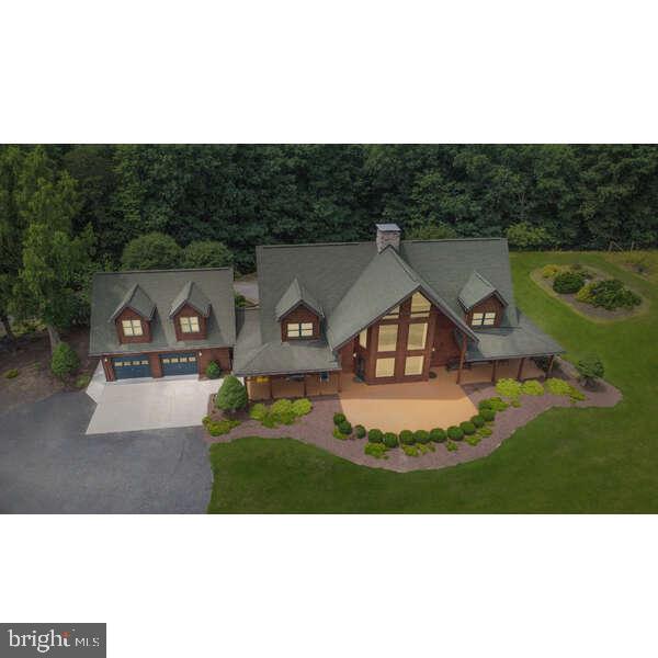 495 Ritchey Road Everett, PA 15537 - Photo 4 of 69 Charming home nestled in lush greenery.