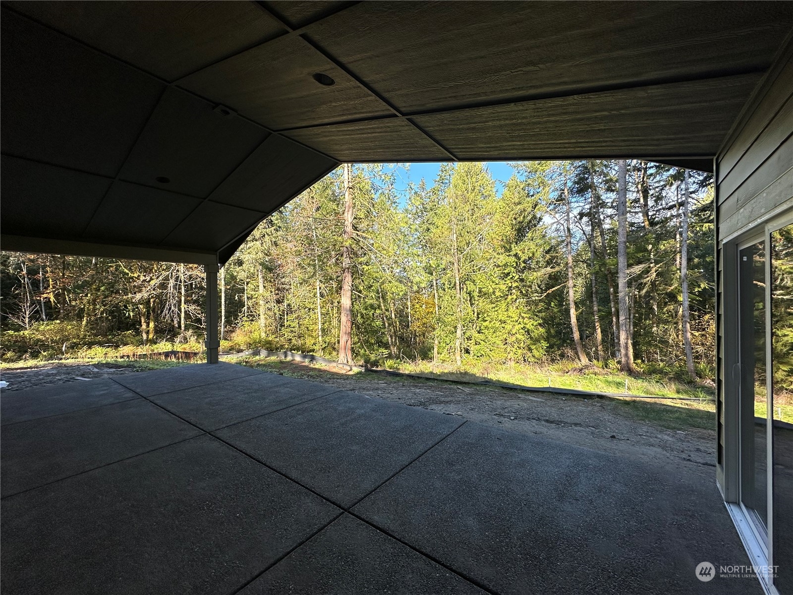 3336 McCary Road Southwest Port Orchard, WA 98367 - Photo 23 of 23 a view of empty room with floor to ceiling window and tree