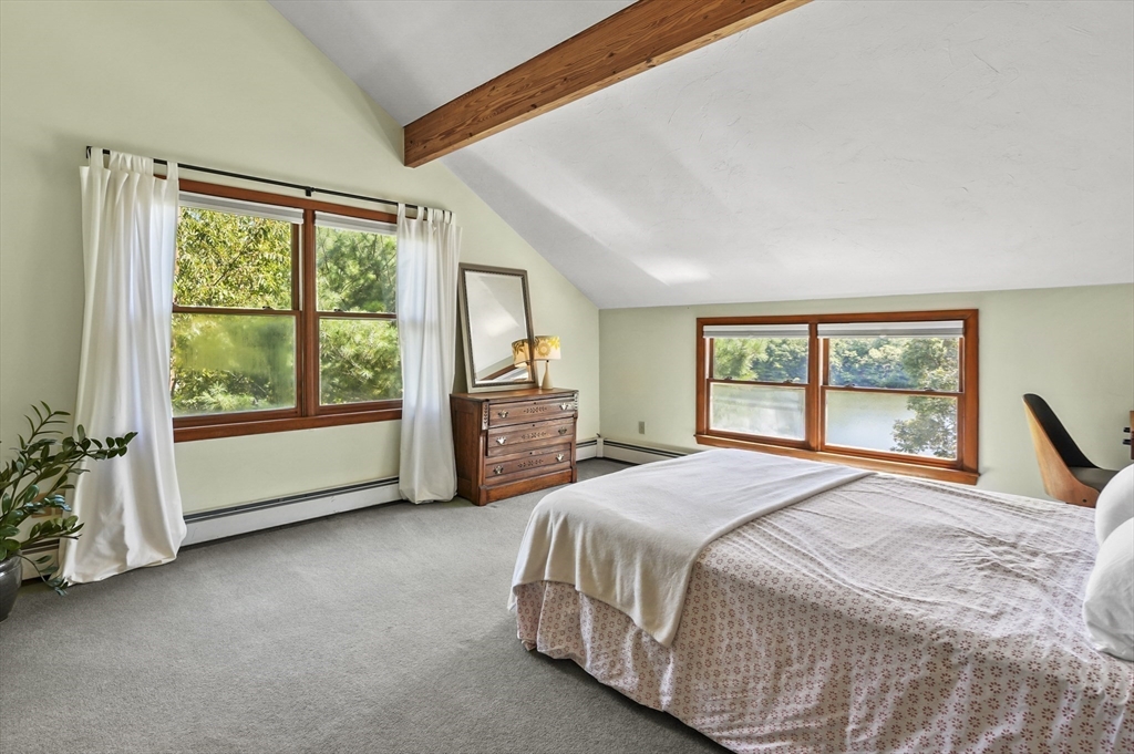 19 Sprague Road Clinton, MA 01510 - Photo 14 of 40 a spacious bedroom with a bed and a large window