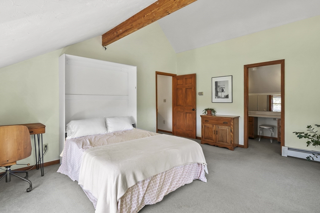 19 Sprague Road Clinton, MA 01510 - Photo 15 of 40 a bedroom with a bed and a chair