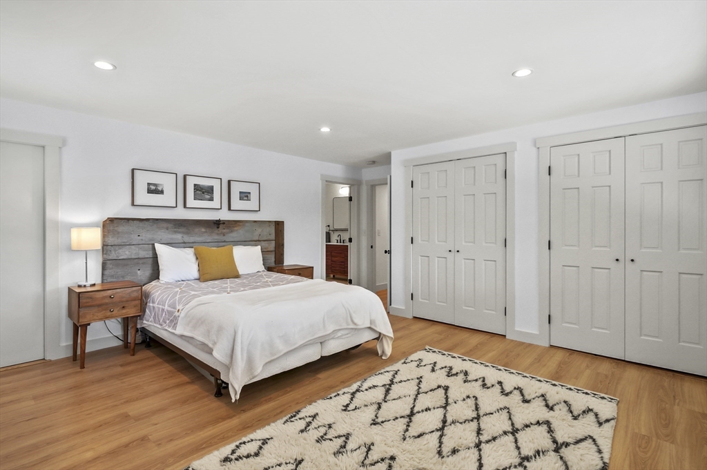 19 Sprague Road Clinton, MA 01510 - Photo 23 of 40 a bedroom with a bed and a lamp