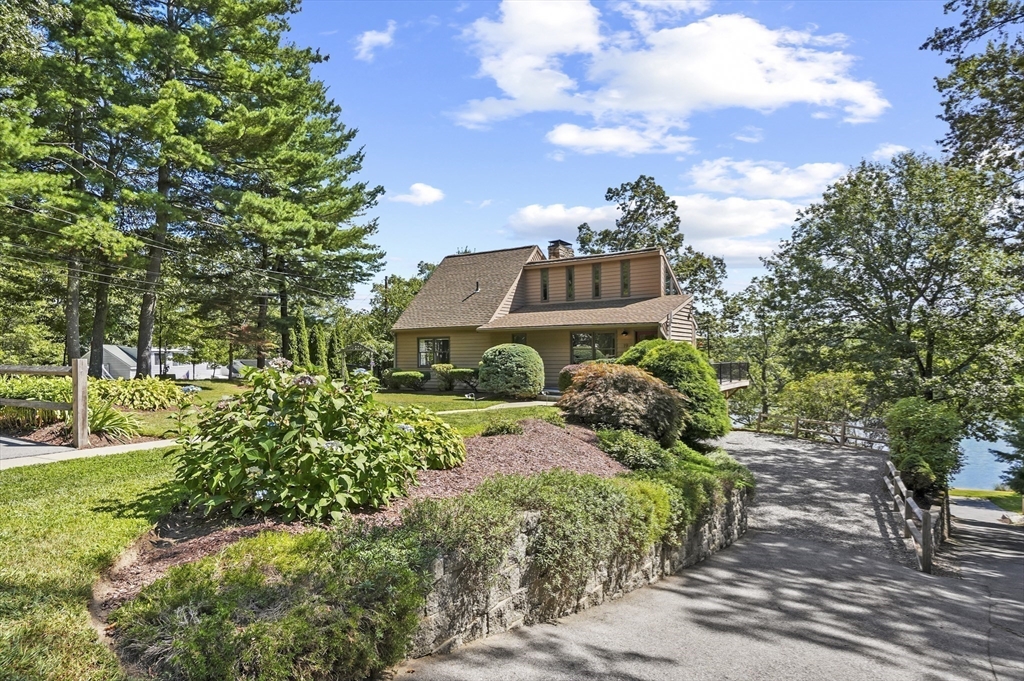 19 Sprague Road Clinton, MA 01510 - Photo 30 of 40 a view of a garden with an outdoor seating