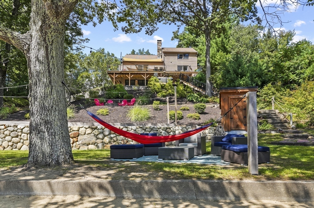 19 Sprague Road Clinton, MA 01510 - Photo 4 of 40 an outdoor space with seating area and trees