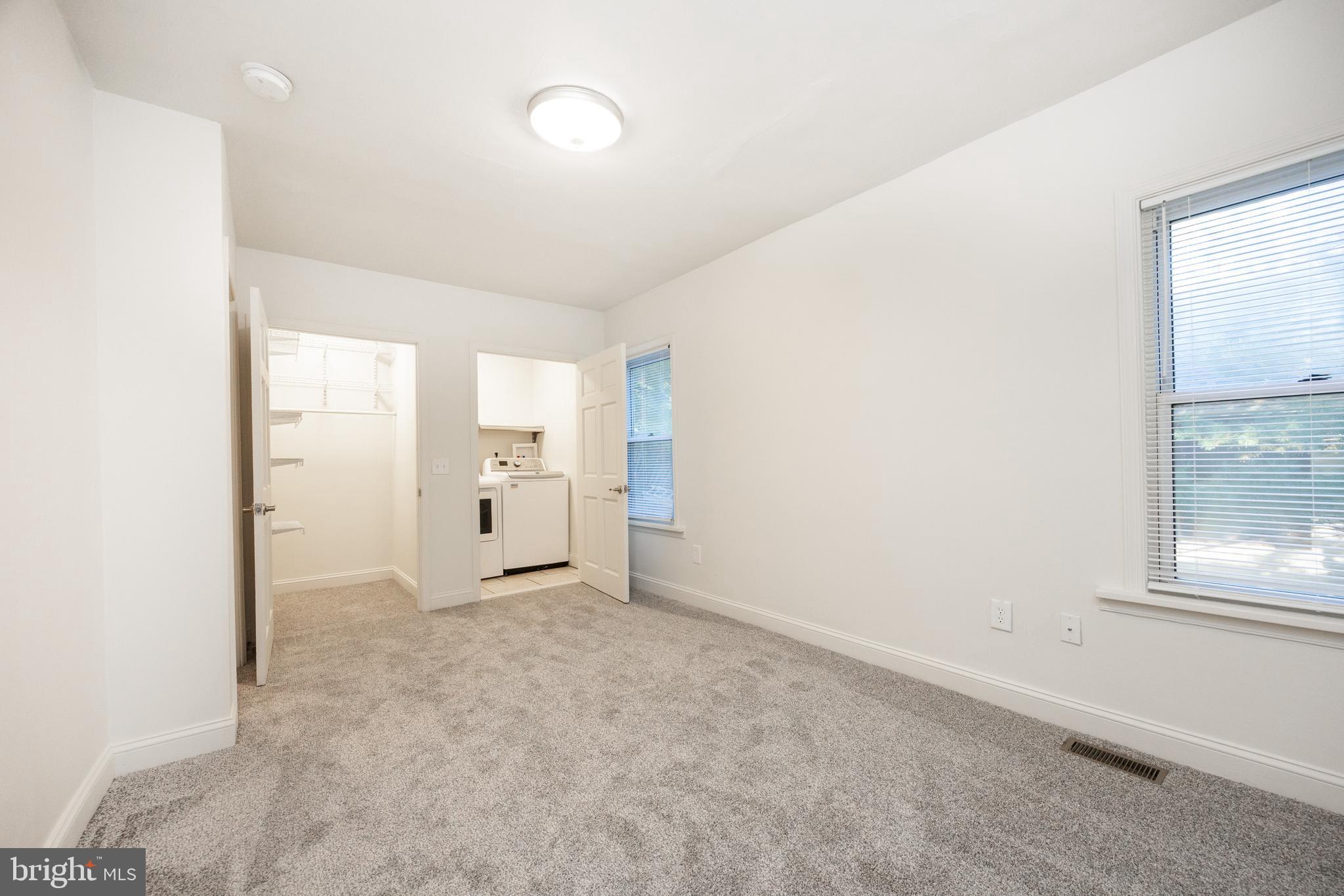 103 Valley View Road Phoenixville, PA 19460 - Photo 14 of 38 an empty room with windows and entrance