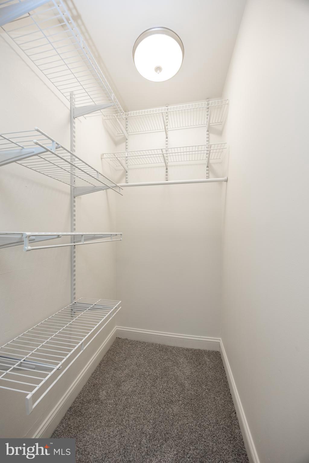 103 Valley View Road Phoenixville, PA 19460 - Photo 18 of 38 a view of a room with racks on the wall