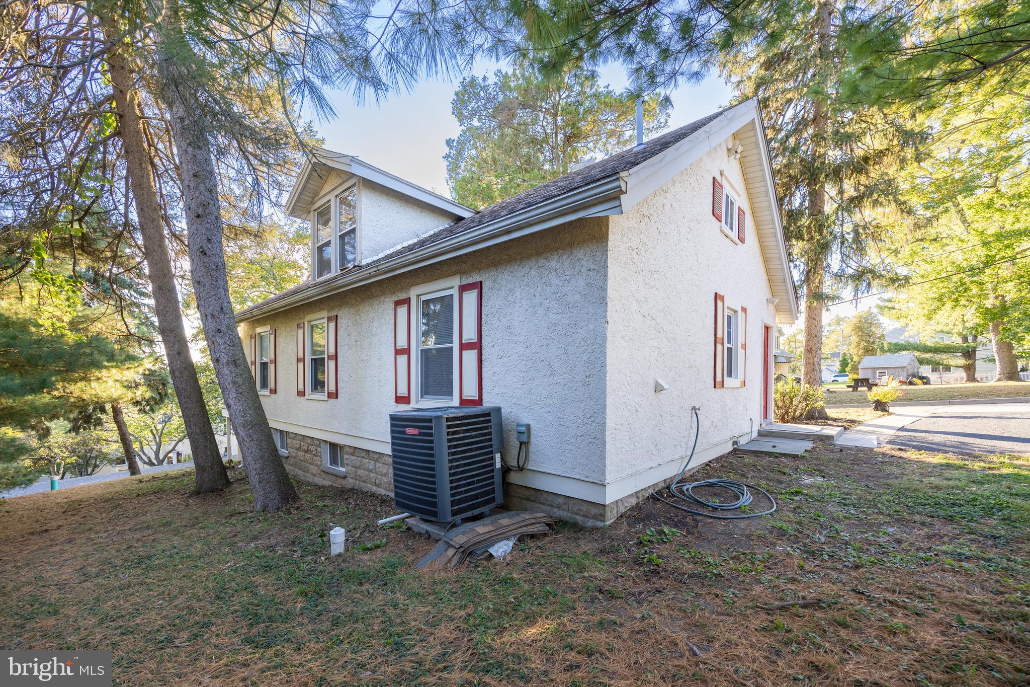 103 Valley View Road Phoenixville, PA 19460 - Photo 37 of 38 a backyard of a house with barbeque oven table and chairs