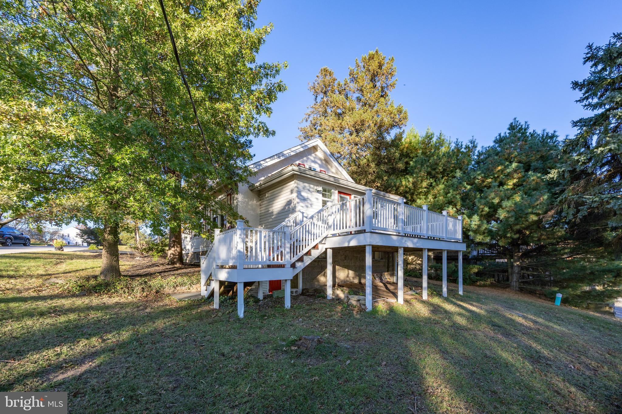 103 Valley View Road Phoenixville, PA 19460 - Photo 4 of 38 a front view of a house with garden