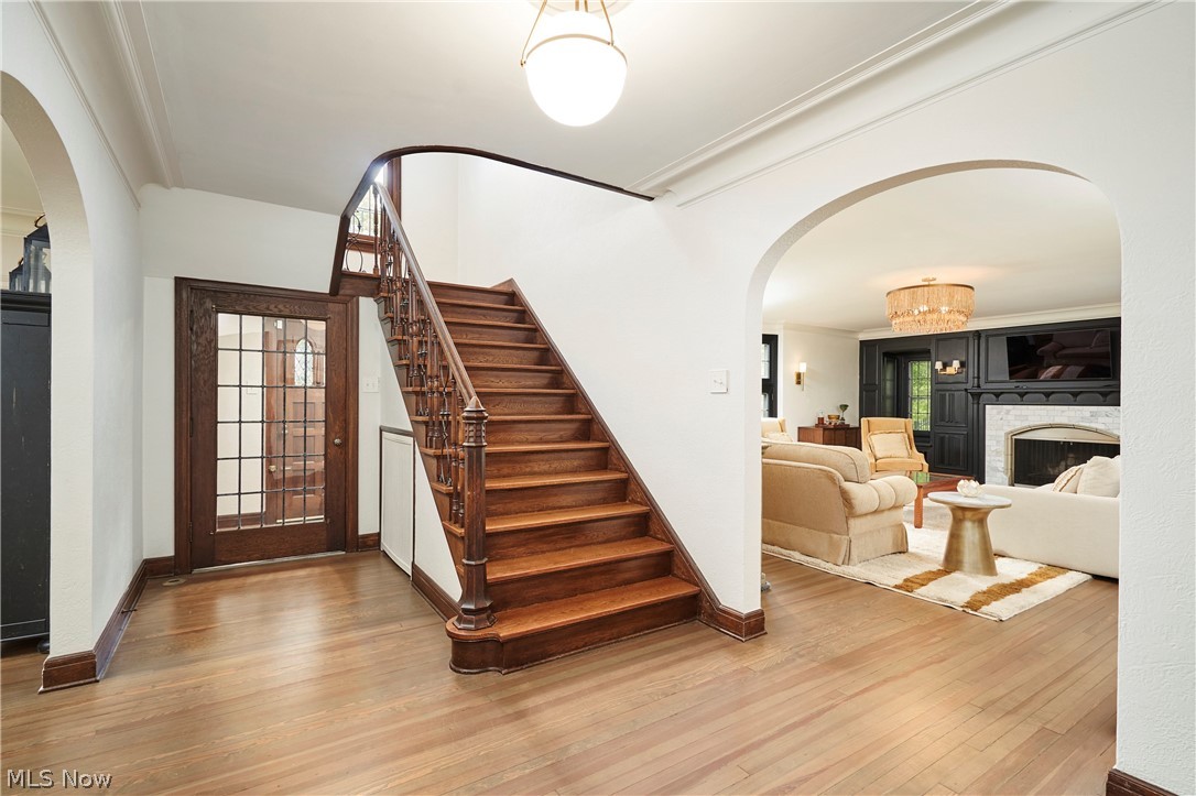 644 Ridgecrest Road Akron, OH 44303 - Photo 24 of 47 Hardwood flooring and a grand staircase with carved wood balusters define the entryway