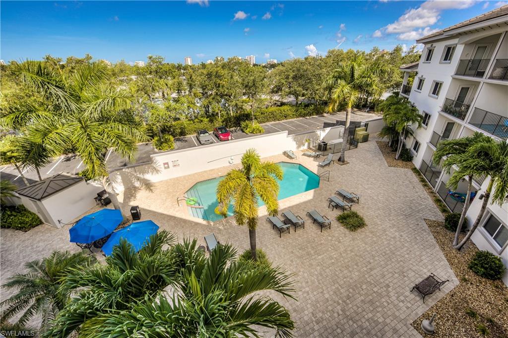 1100 Pine Ridge Road, Unit B104 Naples, FL 34108 - Photo 2 of 2 View of Resort Style Pool