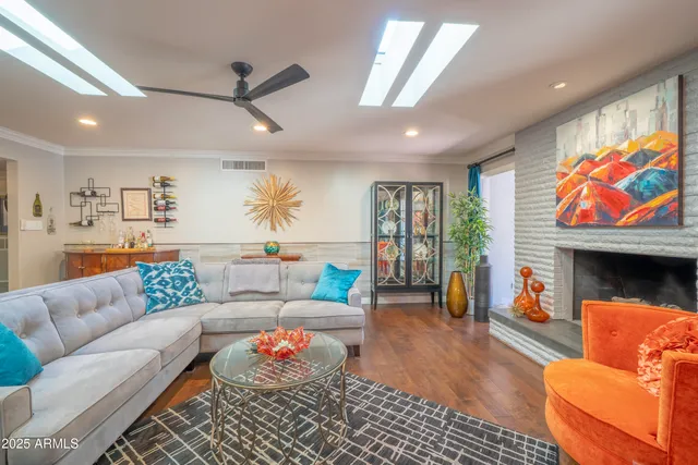 a kitchen with stainless steel appliances granite countertop a refrigerator sink and cabinets