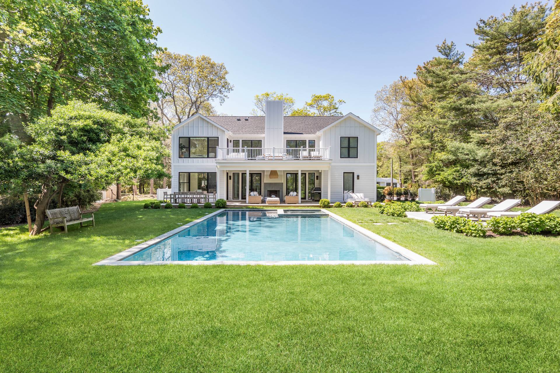 a view of house with a yard