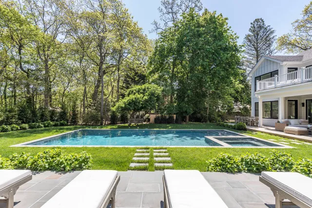 a view of swimming pool with yard